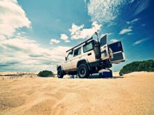 Where It All Began - Blog - Aviation and Ethical Travel (Series Article 4 of 5) - 4x4 Vehicle and Open Doors