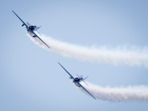 Where It All Began - Blog - Aviation and Ethical Travel (Series Article 1 of 5) - Large Aerial Photography of Two Airplanes Flying