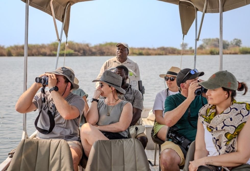 Where It All Began - Namibia & Okavango 4x4 Self Drive African Safari - Chobe - Chobe Elephant Camp - Safari Goers and Guide on Boat Safari