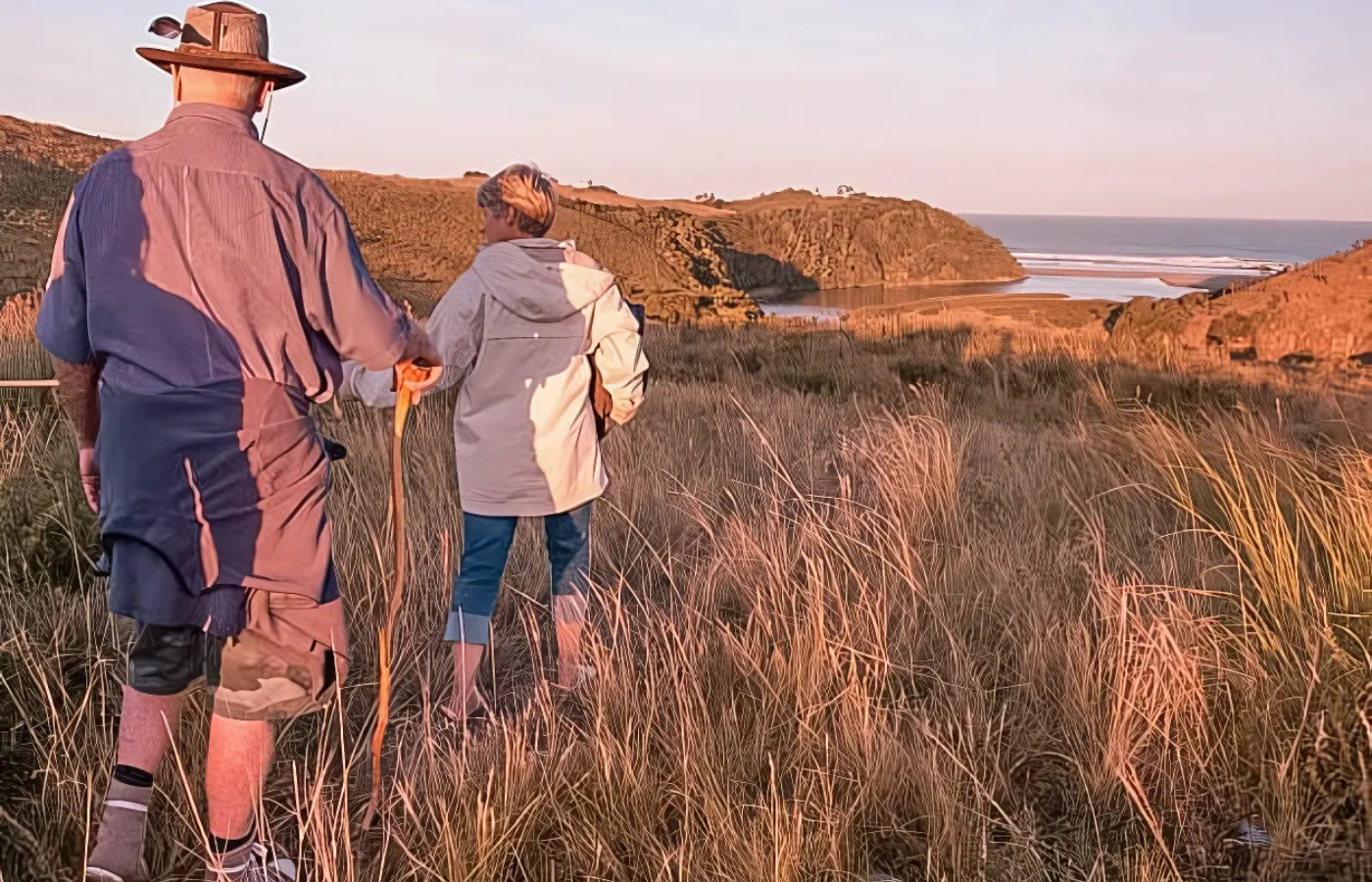 S052 - IT1 - Elderly Couple on Mountain Trail Hike Where It All Began - Journeys - Wild Coast Hotel Hopper - Elderly Couple on Mountain Trail Hike