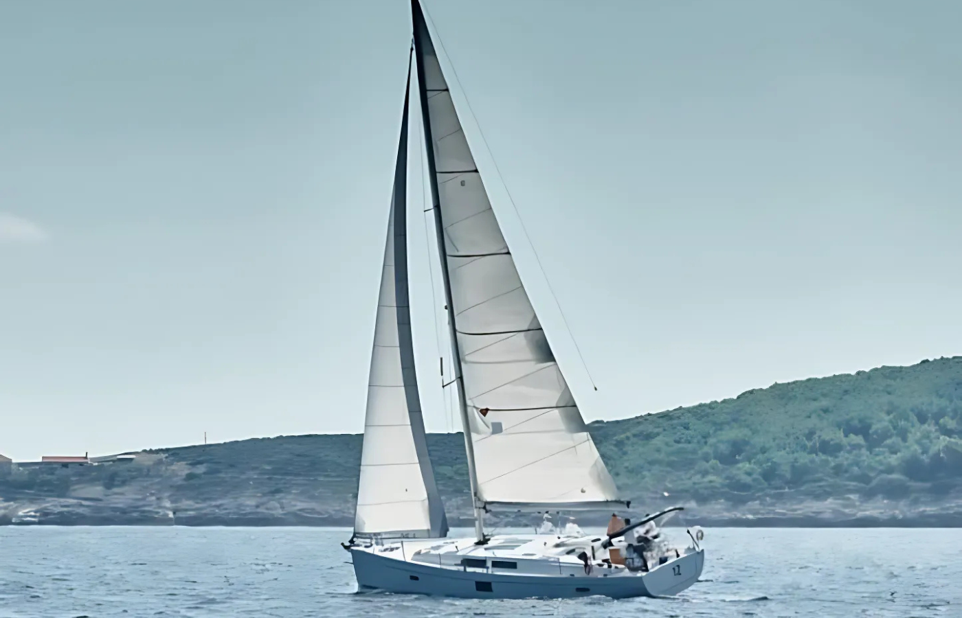 Where It All Began - Journeys - Yacht Sailing around the Cape Peninsula - Small Yacht Out at Sea and Mountain Background