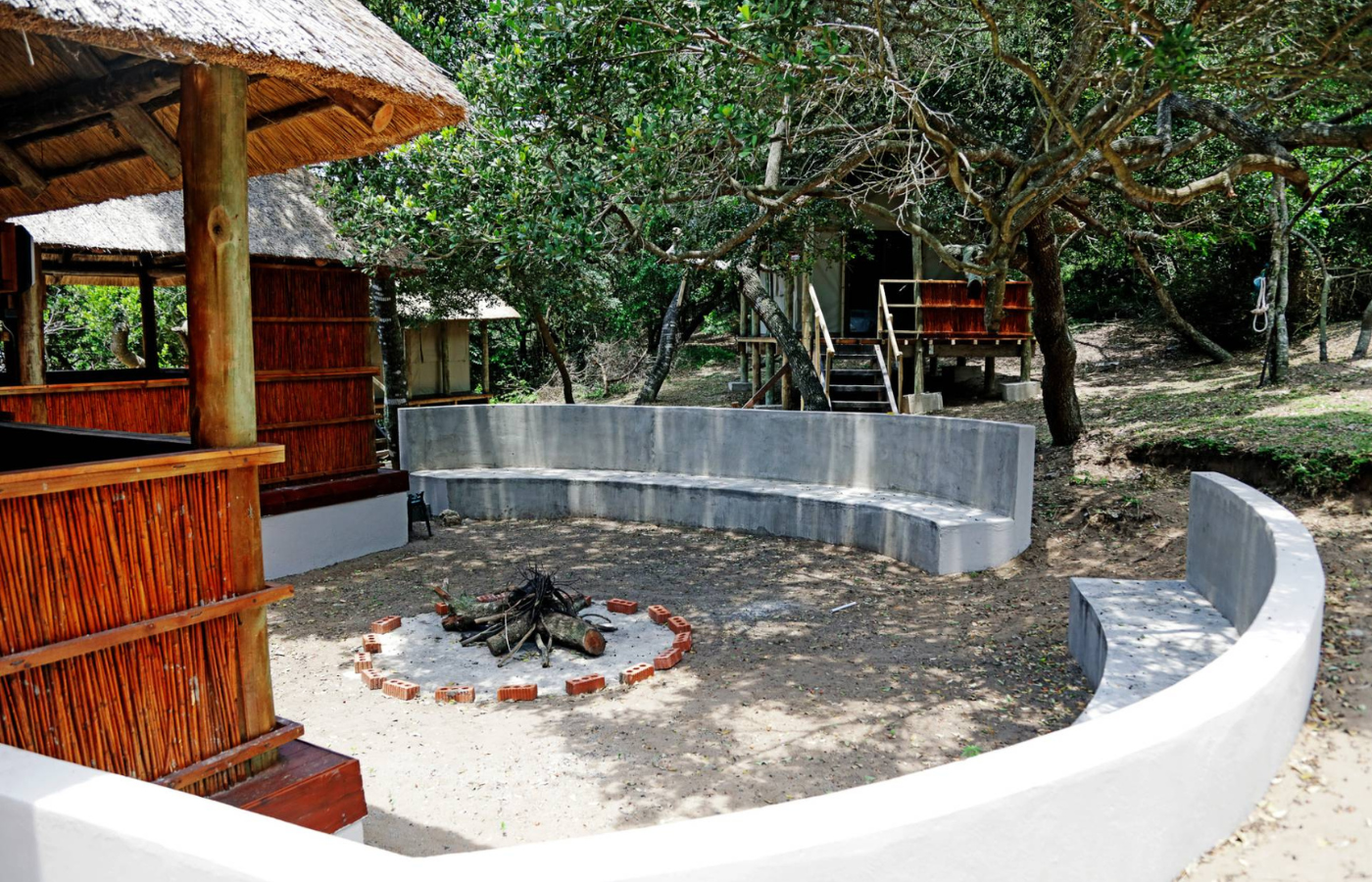 S050 - IT1 - Firepit and Sitting Area at Accommodation Where It All Began - Journeys - Tropical African Lake and Forrest Slackpacking Adventure - Firepit and Sitting Area at Accommodation