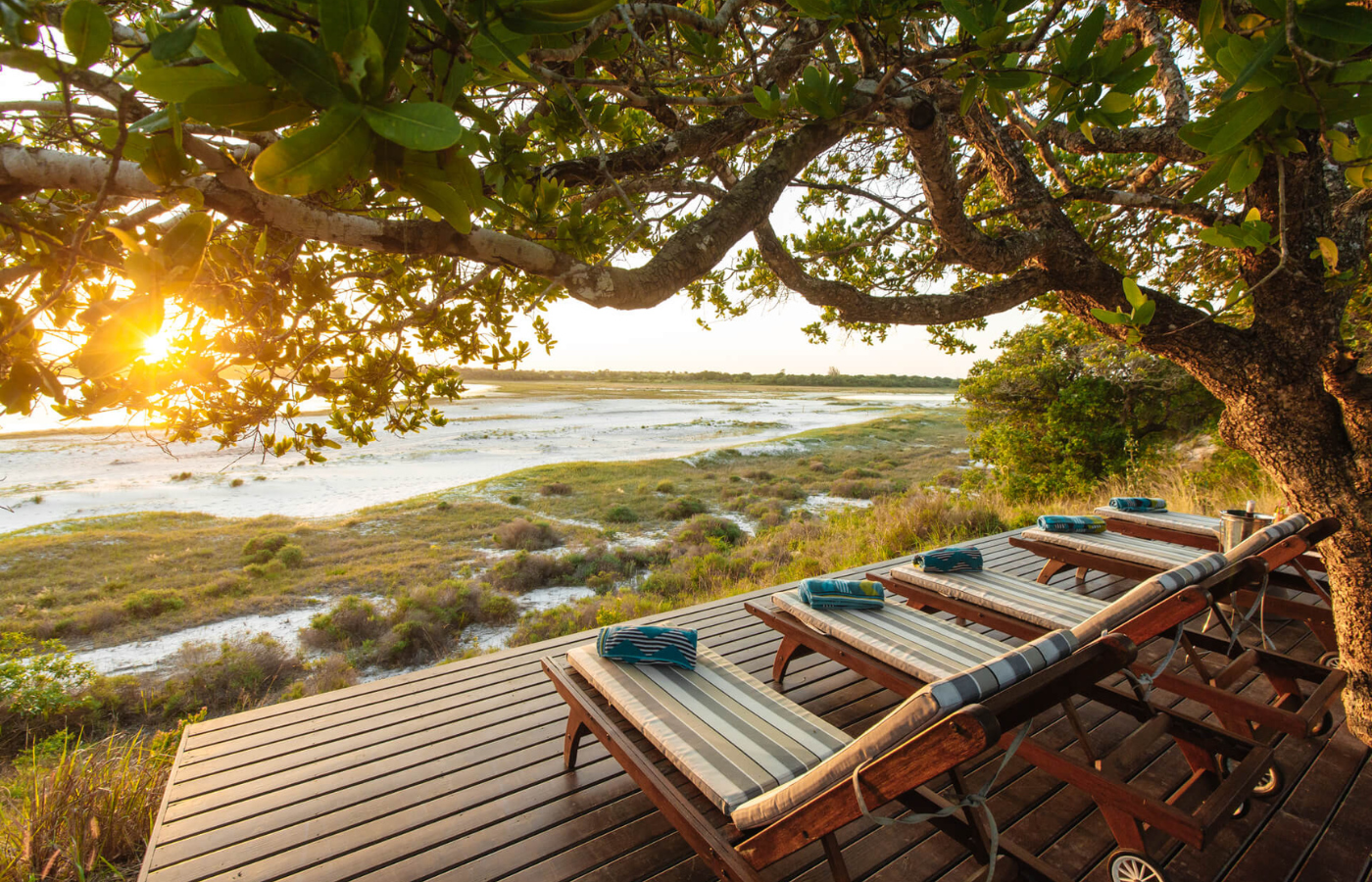S050 - IT2 - Lounging Chairs Overlooking Beautiful Lake View Surrounding Accommodation Where It All Began - Journeys - Tropical African Lake and Forrest Slackpacking Adventure - Lounging Chairs Overlooking Beautiful Lake View Surrounding Accommodation