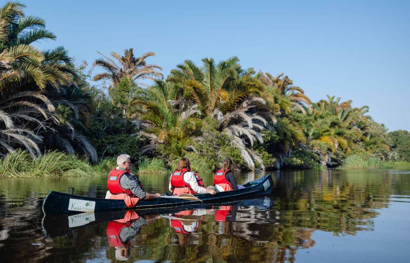 S050 - IT2 - Guest Canoeing on a Lake Where It All Began - Journeys - Tropical African Lake and Forrest Slackpacking Adventure - Guest Canoeing on a Lake