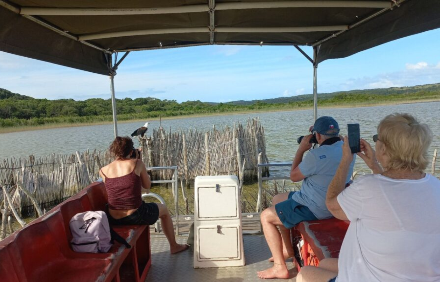 S050 - IT2 - Where It All Began - Journeys - Tropical African Lake and Forrest Slackpacking Adventure - Where It All Began - Journeys - Tropical African Lake and Forrest Slackpacking Adventure - Tourists on Boat Safari