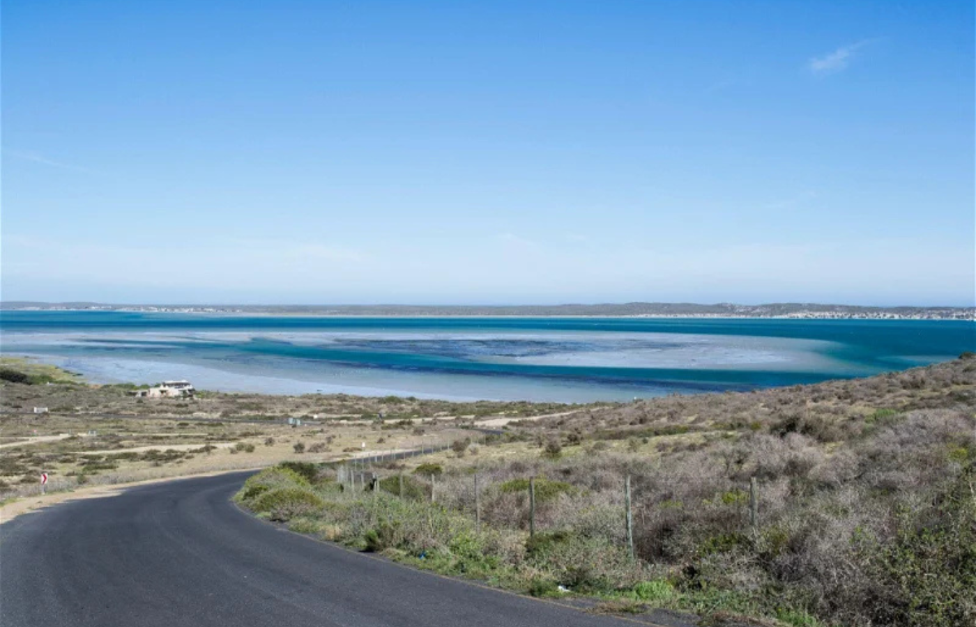 Where It All Began - Journeys - Kitesurfing & Houseboat Escape on the West Coast - Long Dirt Road and Beautiful Ocean View