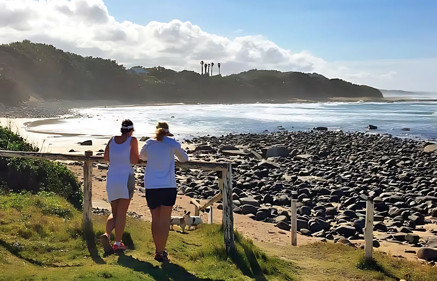 S052 - IT2 - Two Ladies Admiring Beautiful Coastal Beach View on Beach Hike Where It All Began - Journeys - Wild Coast Hotel Hopper - Two Ladies Admiring Beautiful Coastal Beach View on Beach Hike